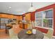 Kitchen featuring stainless appliances, a granite island, and an eat-in breakfast nook at 6533 S Ouray St, Aurora, CO 80016