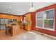 Bright kitchen with granite counters, stainless appliances, recessed lights and natural light at 6533 S Ouray St, Aurora, CO 80016