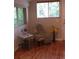 Bright bedroom with hardwood floors and natural light from two large windows at 9075 W 66Th Ave, Arvada, CO 80004