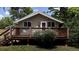 Charming home featuring a cozy front deck and well-maintained front yard at 9075 W 66Th Ave, Arvada, CO 80004