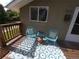 Comfortable front porch with seating, a stylish rug, and natural light at 9075 W 66Th Ave, Arvada, CO 80004