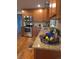The kitchen has granite counters, stainless steel appliances, and stylish fixtures at 9075 W 66Th Ave, Arvada, CO 80004