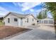 Charming single-Gathering home with well-maintained front yard and detached two-car garage at 3249 W Alaska Pl, Denver, CO 80219