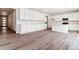 Kitchen featuring sleek white cabinetry, stainless appliances, and ample counter space at 9122 Telluride Ct, Commerce City, CO 80022