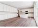 Spacious kitchen with white cabinets, stainless steel appliances, and center island at 9122 Telluride Ct, Commerce City, CO 80022