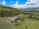Beautifully landscaped property featuring a gorgeous mountain home with spectacular views of the surrounding mountains at 174 Sage Dr, Breckenridge, CO 80424