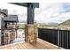 Enjoy breathtaking mountain views from this private balcony with wood decking at 174 Sage Dr, Breckenridge, CO 80424