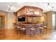 Entertainment area boasts a custom bar with seating for many and a large television at 174 Sage Dr, Breckenridge, CO 80424