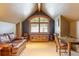 Cozy bonus room with a stone fireplace and charming window nook at 174 Sage Dr, Breckenridge, CO 80424