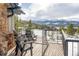 Private deck with mountain views and lounge chairs at 174 Sage Dr, Breckenridge, CO 80424