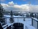 Picturesque snowy mountain views from a cozy deck with comfortable seating at 174 Sage Dr, Breckenridge, CO 80424