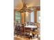 Formal dining room with antler chandelier and seating for ten at 174 Sage Dr, Breckenridge, CO 80424