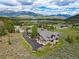 Large home with mountain views and a long, private driveway at 174 Sage Dr, Breckenridge, CO 80424