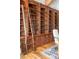 Custom home office featuring built-in bookshelves with rolling ladder at 174 Sage Dr, Breckenridge, CO 80424