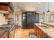 Spacious kitchen with granite countertops, stainless steel appliances, and custom cabinetry at 174 Sage Dr, Breckenridge, CO 80424