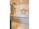 Beautifully tiled shower with mosaic accents and dual shower heads at 174 Sage Dr, Breckenridge, CO 80424