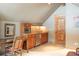 Convenient wet bar area featuring wooden cabinetry, sink, and microwave at 174 Sage Dr, Breckenridge, CO 80424