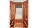 Custom-built wine cellar with wooden shelving and drawers, perfect for storage at 174 Sage Dr, Breckenridge, CO 80424
