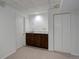 Finished basement with carpet, wet bar, and double door closet at 2466 S Vaughn Way # A, Aurora, CO 80014