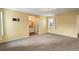 Spacious bedroom with plush carpeting, large windows, and ensuite access at 2466 S Vaughn Way # A, Aurora, CO 80014