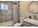 Updated bathroom with a tub and shower combo at 725 Osceola St, Denver, CO 80204