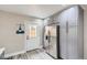 Modern kitchen with gray cabinets, stainless steel appliances and island at 725 Osceola St, Denver, CO 80204