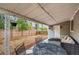 Covered patio with table and chairs, offering an outdoor dining space at 725 Osceola St, Denver, CO 80204