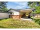 Open back patio is perfect for entertaining and enjoying the backyard at 12475 W 38Th Ave, Wheat Ridge, CO 80033