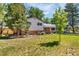 Charming two-story home with brick and siding exterior and a well-manicured lawn at 12475 W 38Th Ave, Wheat Ridge, CO 80033