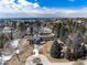 Aerial view of the house with a glass enclosed walkway and circular driveway at 3720 E Quincy Ave, Cherry Hills Village, CO 80113