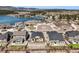 A high angle view of a well-planned neighborhood with houses near a lake and mountains at 17855 Lake Side Dr, Monument, CO 80132