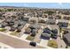 Aerial view of a Primary-planned community with sidewalks, manicured lawns, and scenic views at 17855 Lake Side Dr, Monument, CO 80132