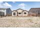 Nice backyard with privacy fence, rock landscaping, and sliding glass doors leading indoors for outdoor living at 17855 Lake Side Dr, Monument, CO 80132