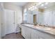 Spacious bathroom with double sinks, plenty of counter space, and a well-lit vanity area at 17855 Lake Side Dr, Monument, CO 80132