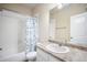 Clean bathroom featuring a vanity with sink, toilet and a shower with tub combination at 17855 Lake Side Dr, Monument, CO 80132