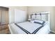 Cozy bedroom with a comfortable bed, stylish headboard, and ample closet space at 17855 Lake Side Dr, Monument, CO 80132