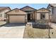 Charming single-Gathering home with well-maintained lawn and two-car garage in a suburban neighborhood at 17855 Lake Side Dr, Monument, CO 80132