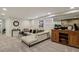 A basement living room with carpet floors, white walls, and stylish decor at 916 Adams St, Denver, CO 80206