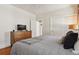 Bedroom featuring a dresser and large sliding door closet at 916 Adams St, Denver, CO 80206