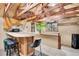 Finished basement featuring bar area, decorative lighting, and ample counter space at 2654 Sinton Rd, Evergreen, CO 80439