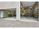 Expansive garage interior with an open layout, workbench, and ample storage space at 2654 Sinton Rd, Evergreen, CO 80439