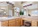 Large bathroom with double sinks and vanity at 12444 Knox Ct, Broomfield, CO 80020