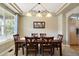 Formal dining room with hardwood floors and a chandelier at 12444 Knox Ct, Broomfield, CO 80020