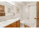 Clean bathroom with a shower-tub combination, vanity, and neutral finishes at 13606 E Bates Ave # 309, Aurora, CO 80014