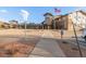 Exterior view of clubhouse and front entrance, crosswalk and landscaping around the entry at 13606 E Bates Ave # 309, Aurora, CO 80014