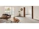 Cozy living room with a sliding glass door and neutral color scheme at 13606 E Bates Ave # 309, Aurora, CO 80014