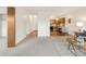 The living room leads to the kitchen and dining area at 13606 E Bates Ave # 309, Aurora, CO 80014