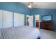 Spacious bedroom featuring carpet, a closet, and a large dresser at 749 Westward Ln, Palmer Lake, CO 80133