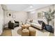 Finished basement living room featuring modern decor and neutral paint at 3740 E Martin Luther King Jr Blvd, Denver, CO 80205