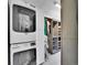 Convenient laundry room with storage and closet at 10388 Lions Path, Lone Tree, CO 80124
